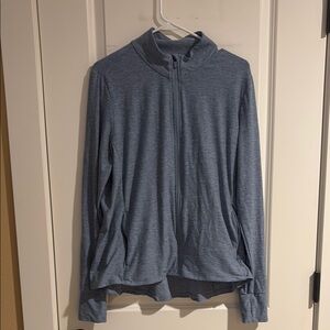 NWOT Wander Heather Blue workout zip up with thumb holes and zipper pockets